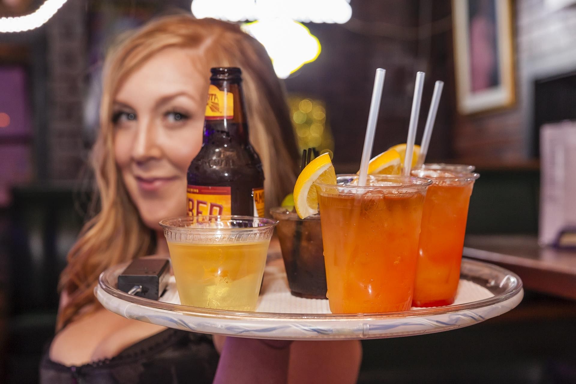 Bartender with Drinks at Bourbon Street Blues and Boogie Bar